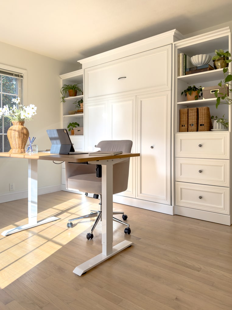 Home office with a standing desk and Versatile collection Murphy bed