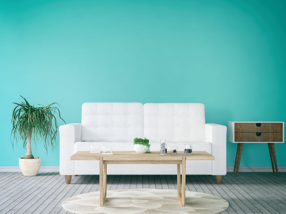 Living room refreshed with a turquoise accent wall