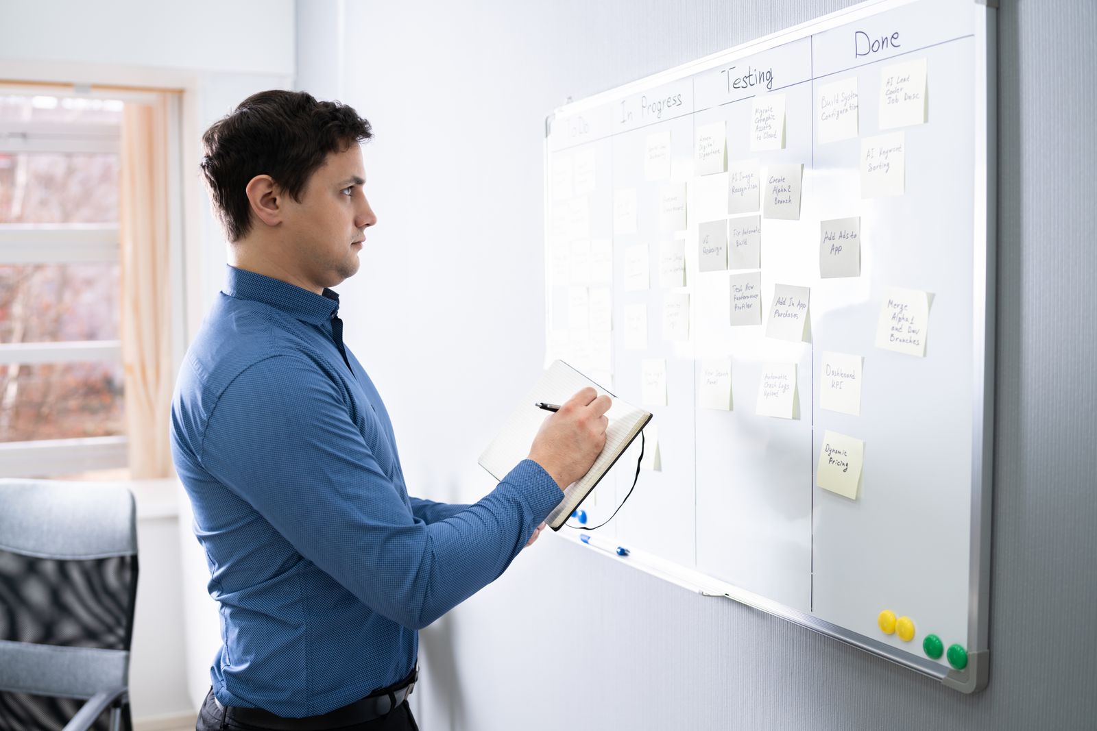 Man using home office whiteboard