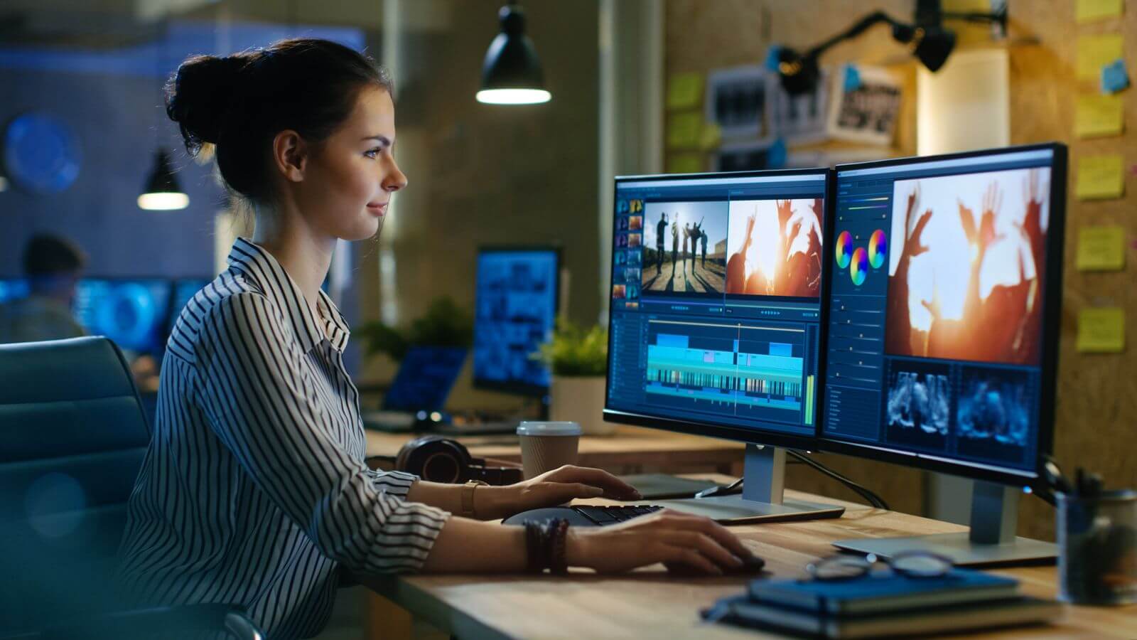 Woman creating video on desktop computer