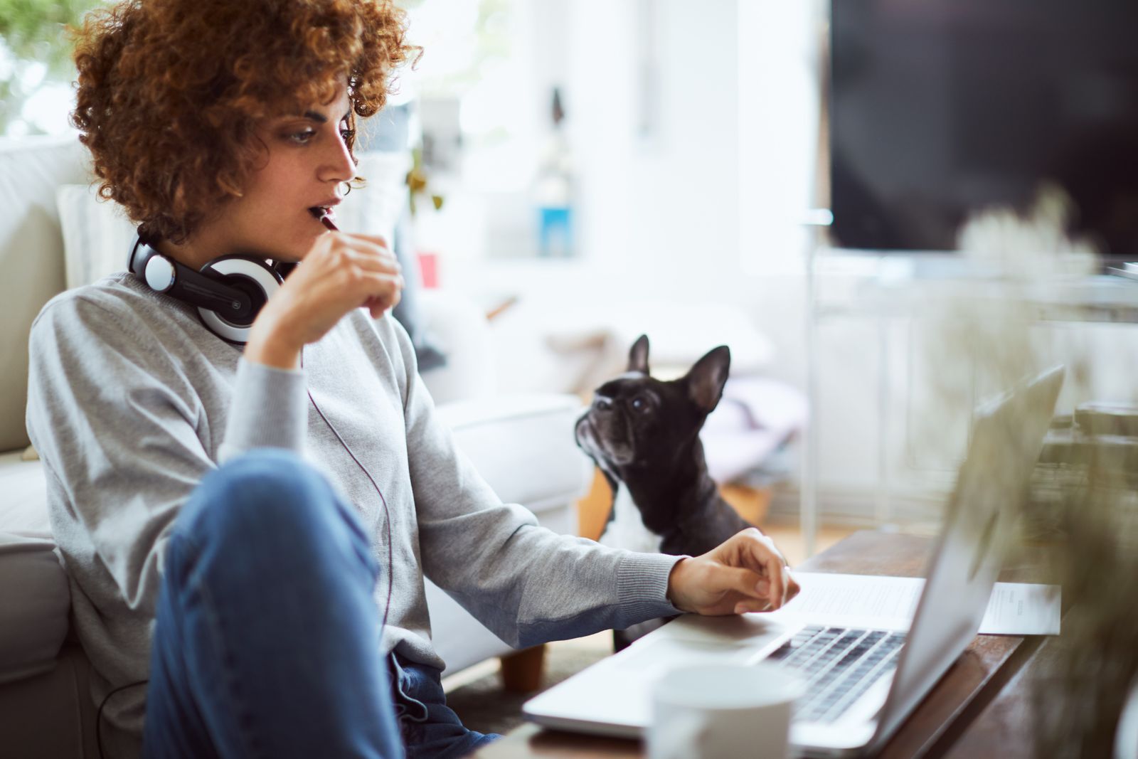 Woman working on computer from home