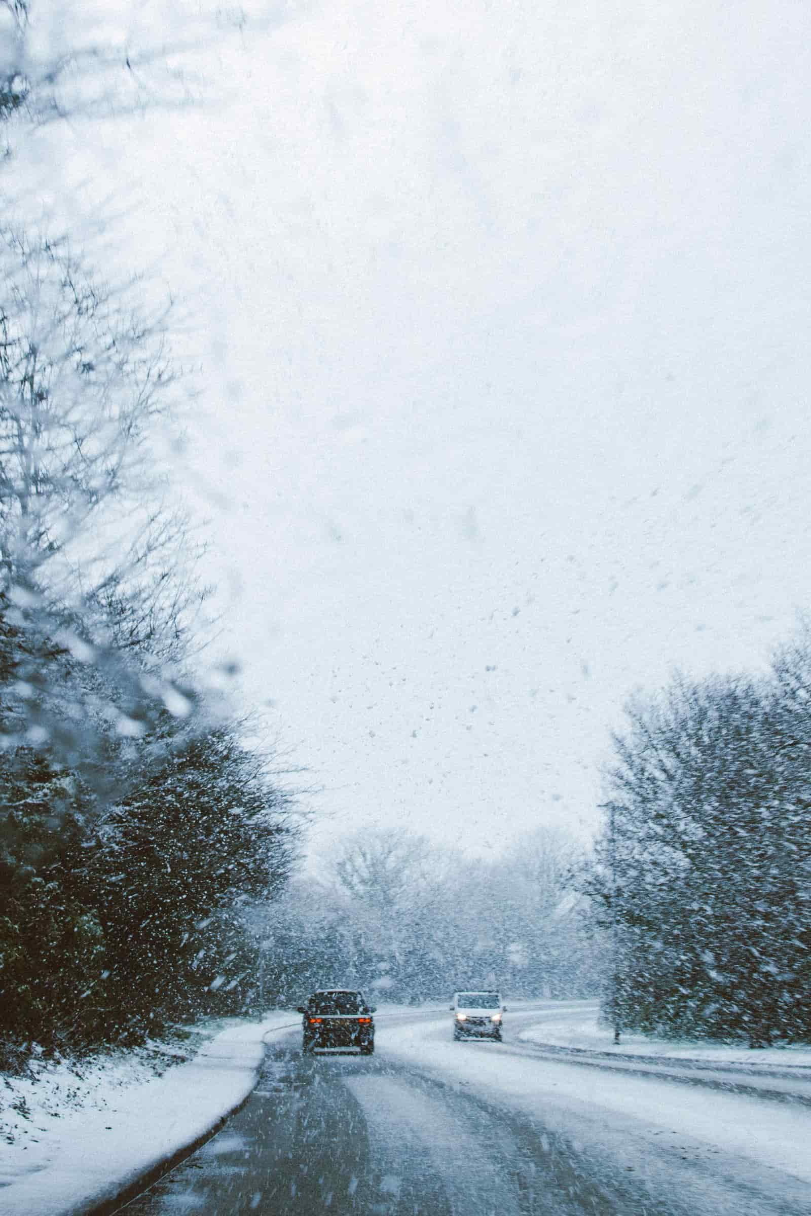 Cars on the road during snowstorm