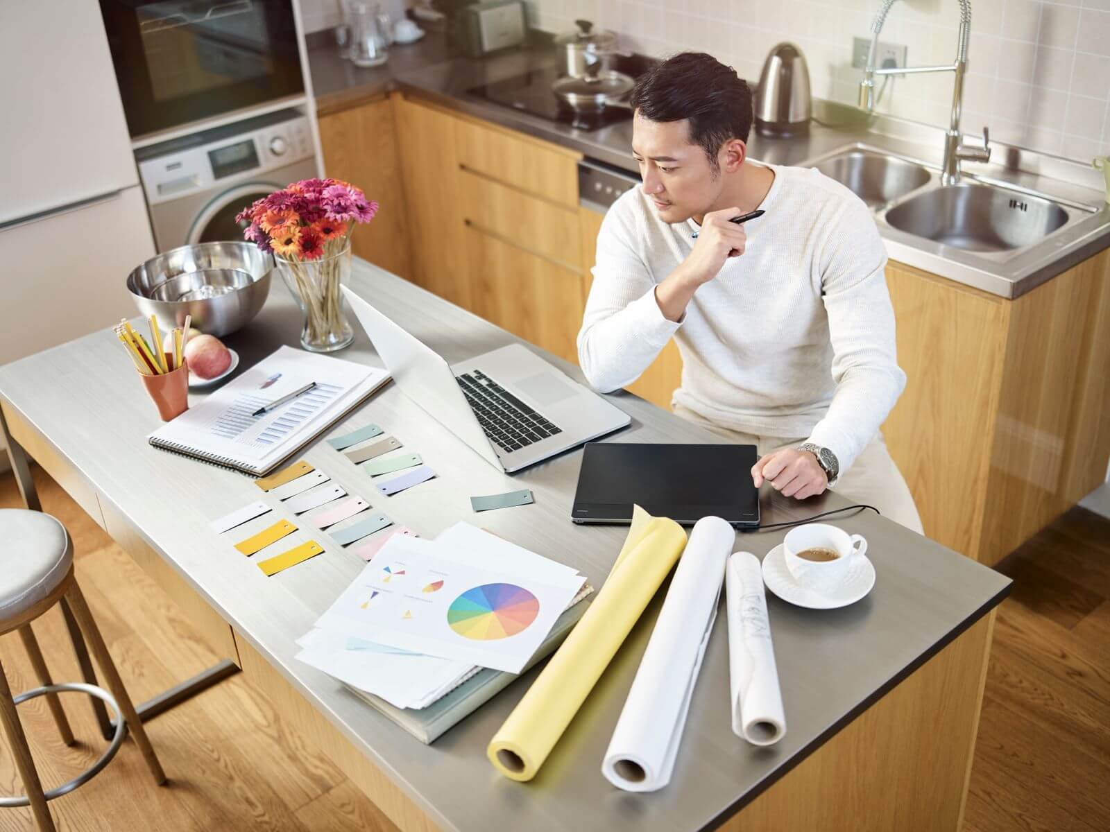 Man working at his kitchen counter