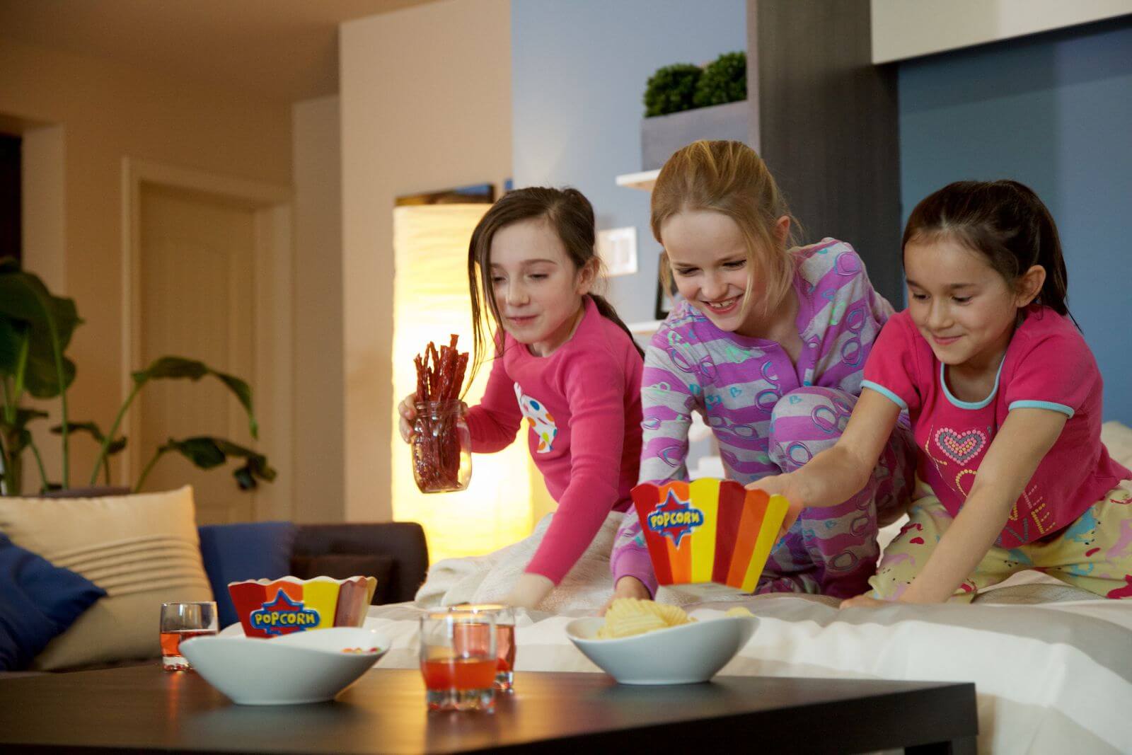 Children playing on a Bestar Murphy bed