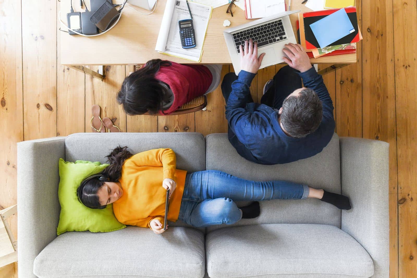 Father working at home with children