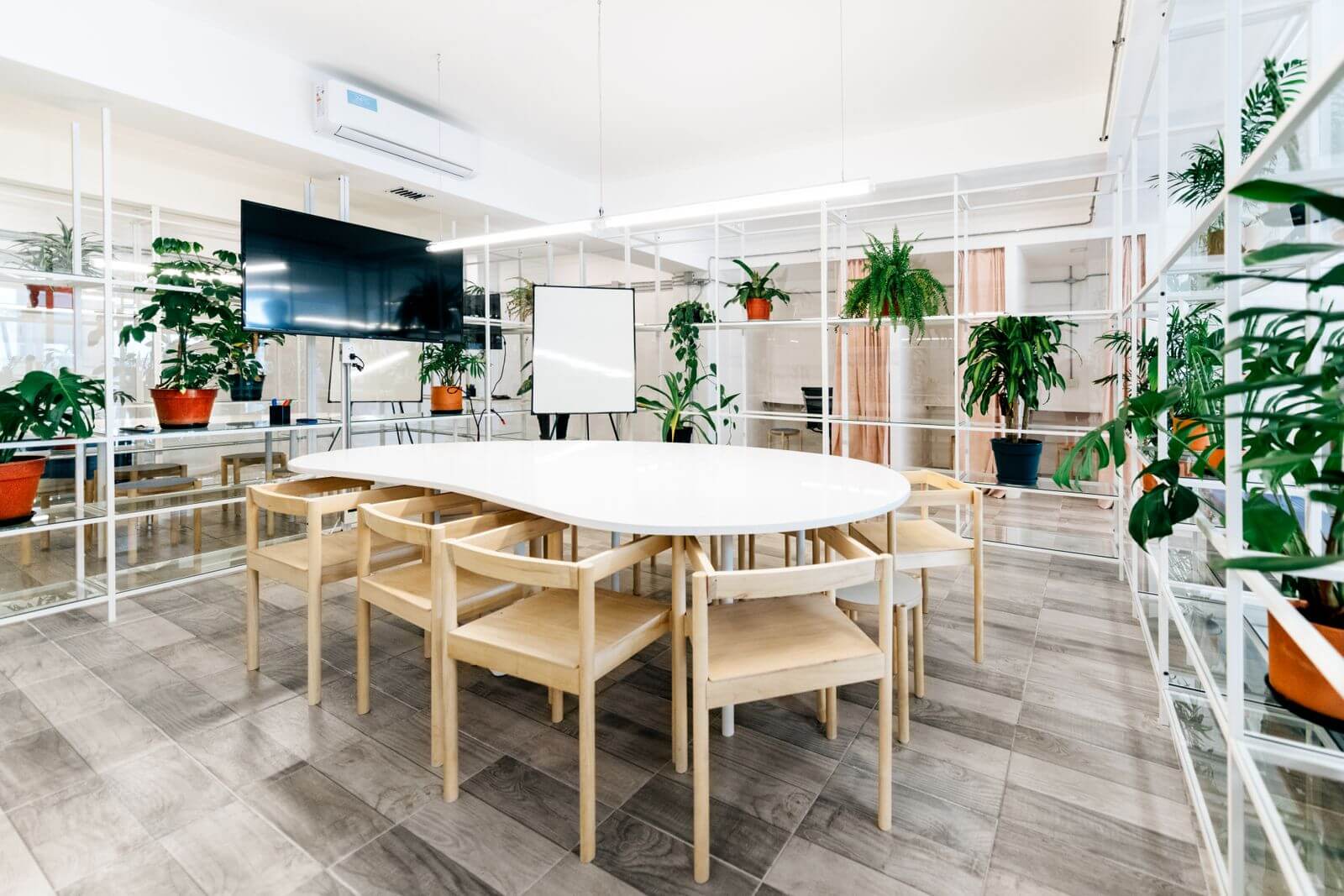 Office with plants and glass walls