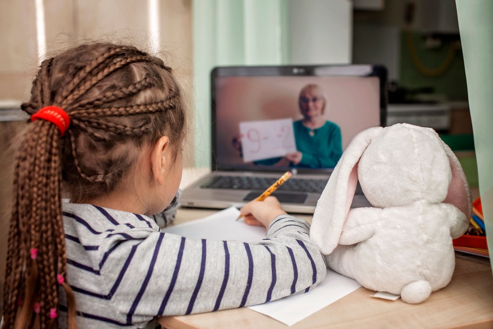 Little girl learning online