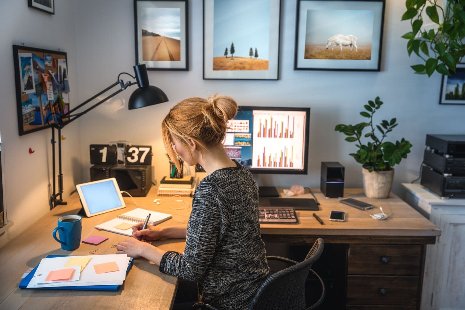 women working on an L shaped desk