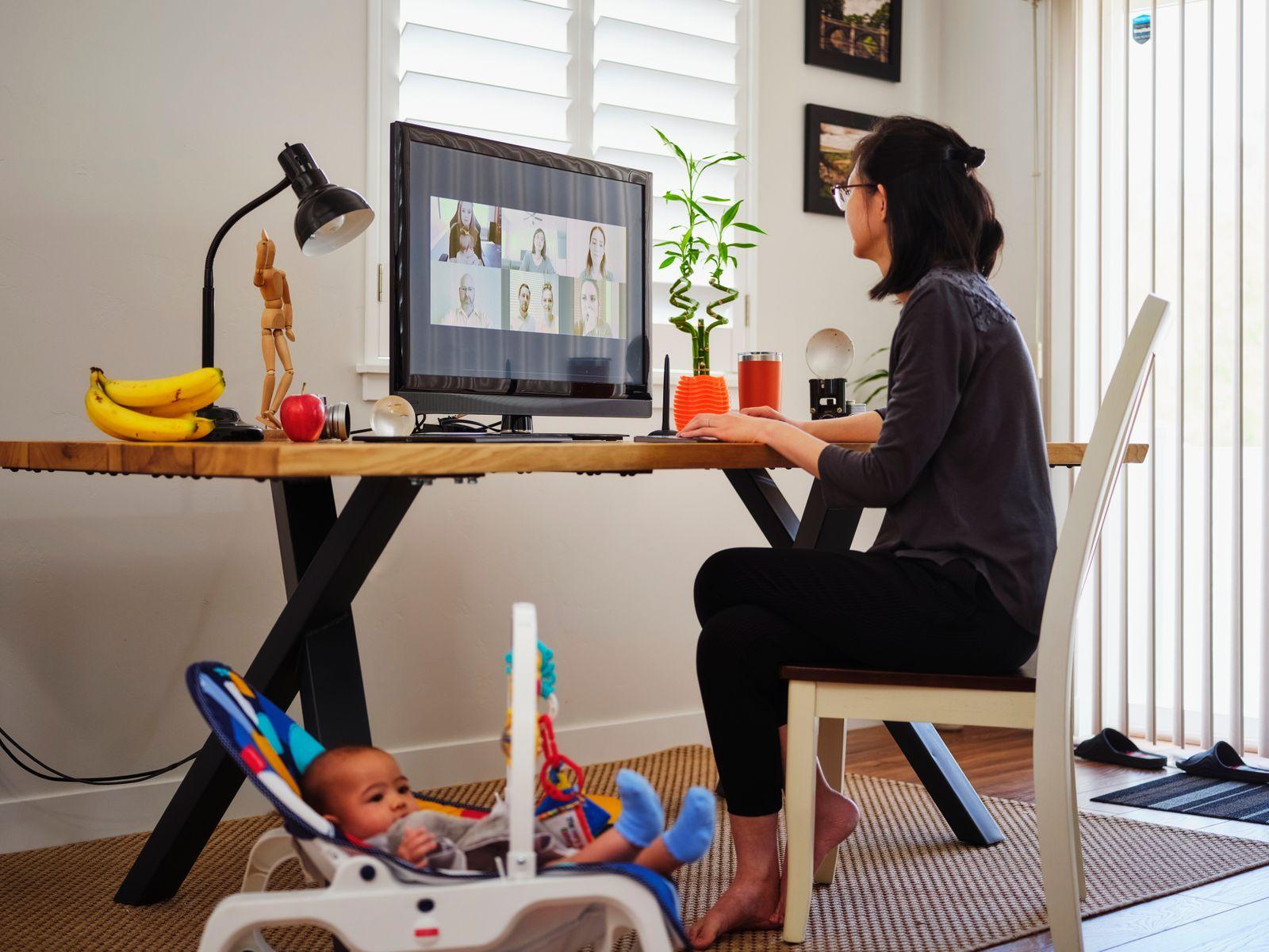 Mom working from home with her baby