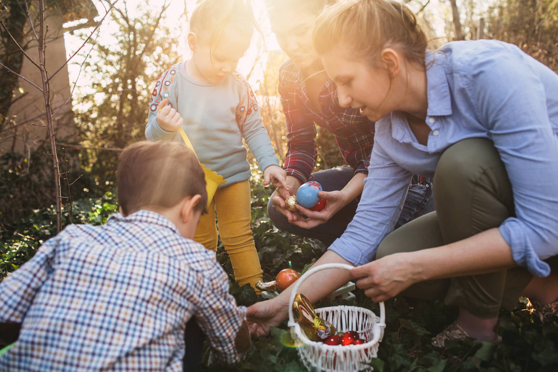 family hunting easter eggs