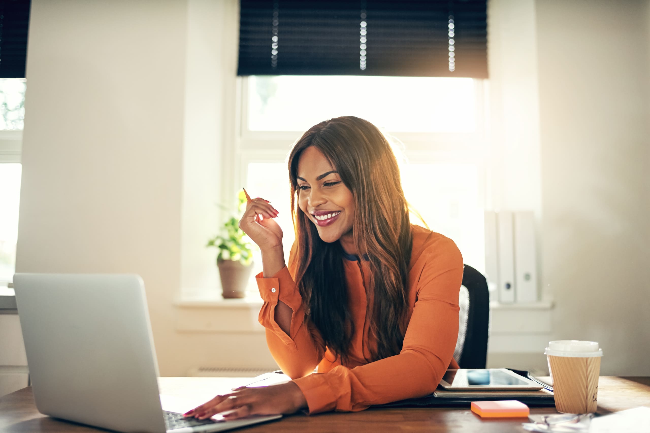 woman working from home coffee