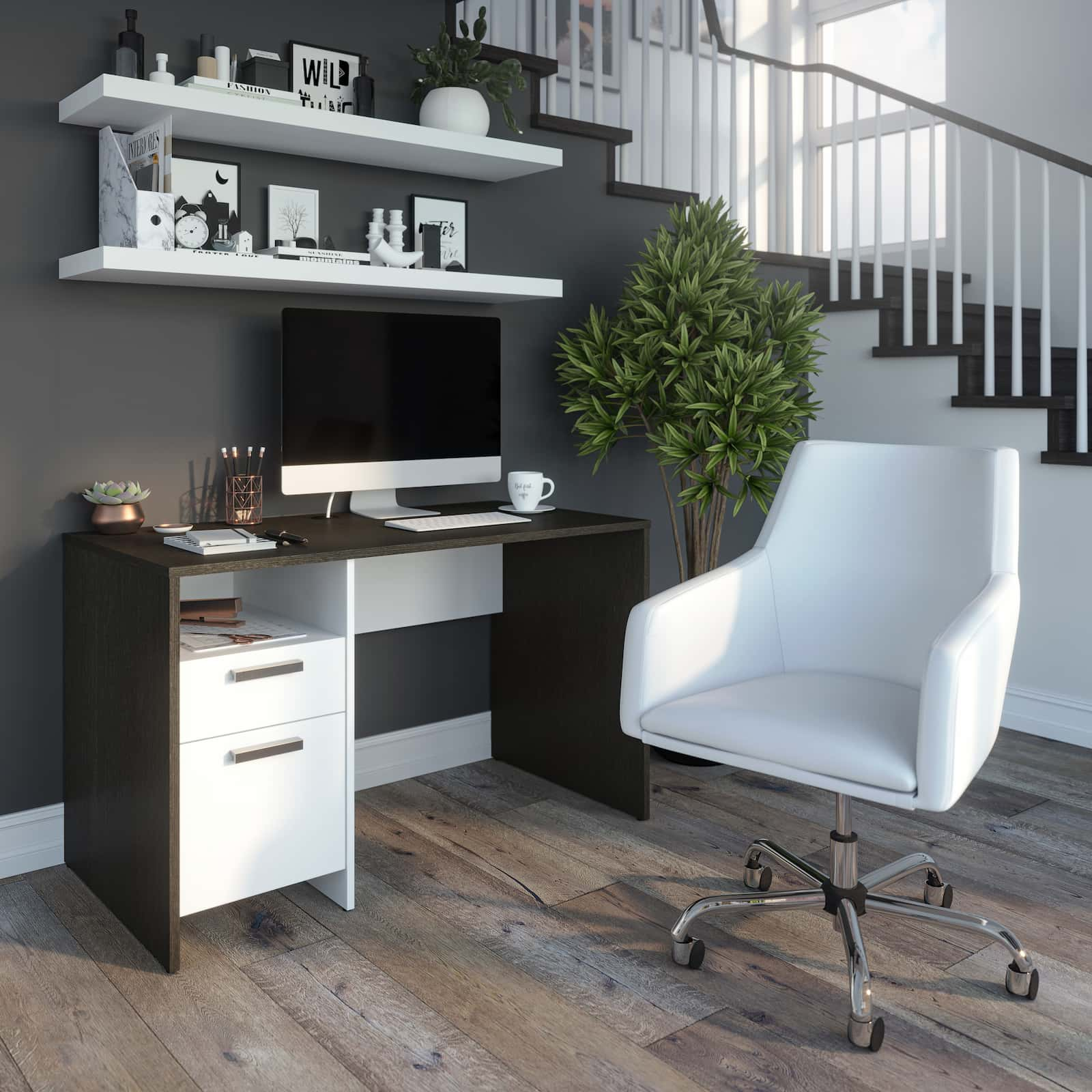 small home office desks with shelves on the wall over the desk. white swivel chair. big potted plant on the right. staircase on the right.