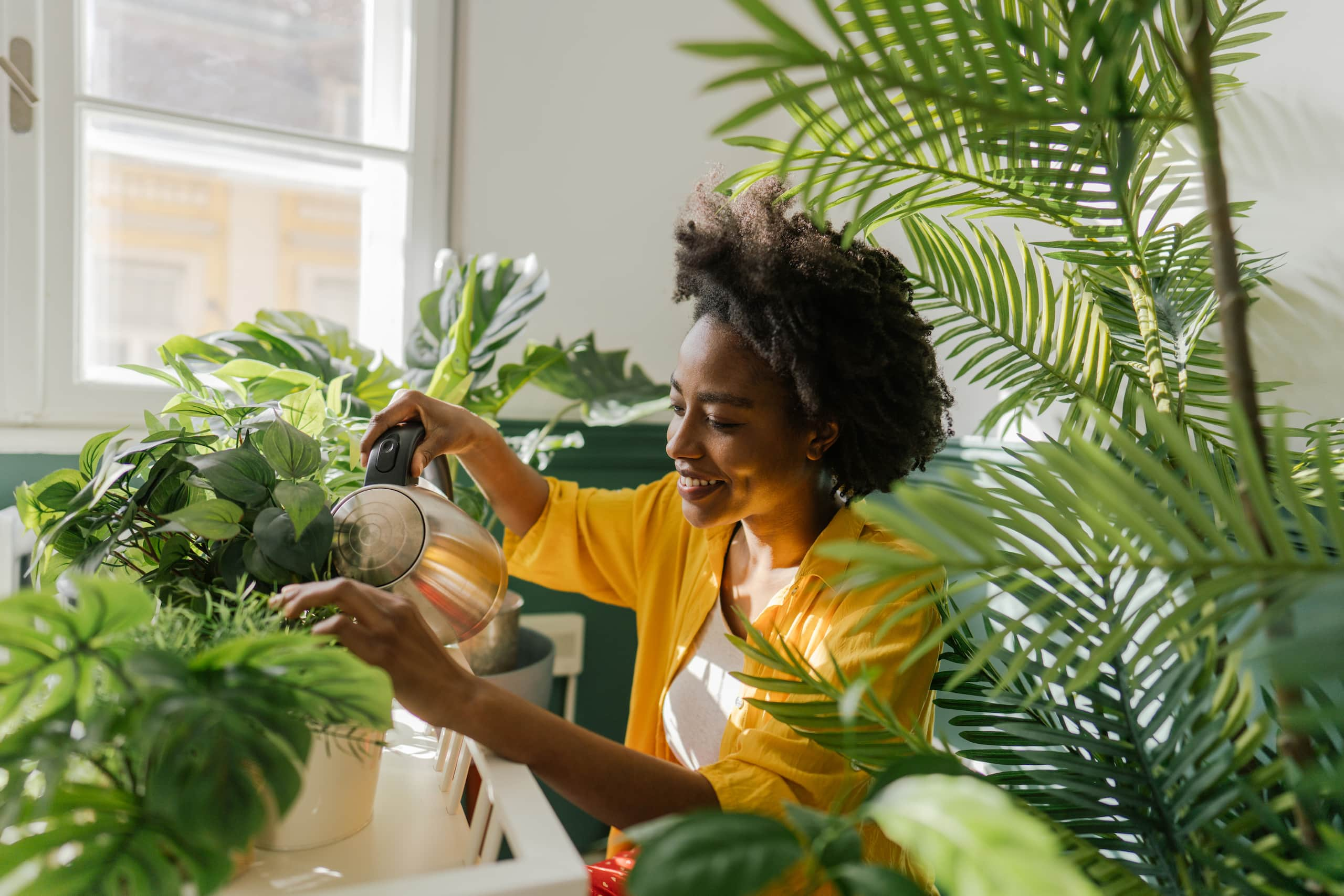 Woman watering her plants