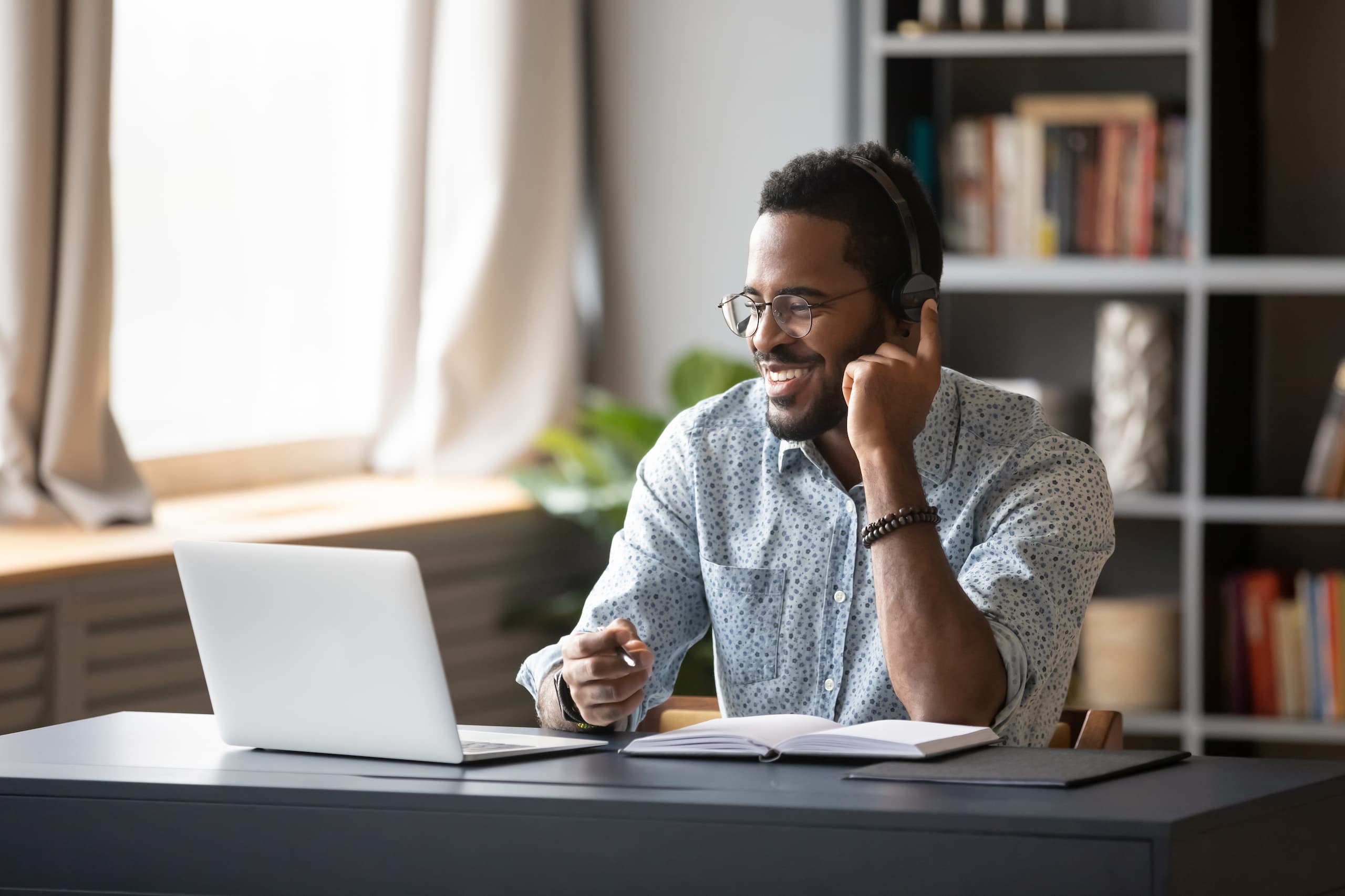 Man working from home with headphones