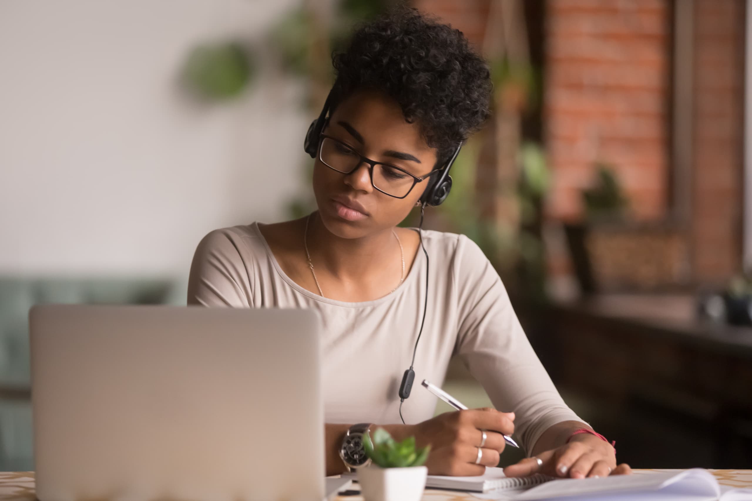 Young woman focused in a productive study space